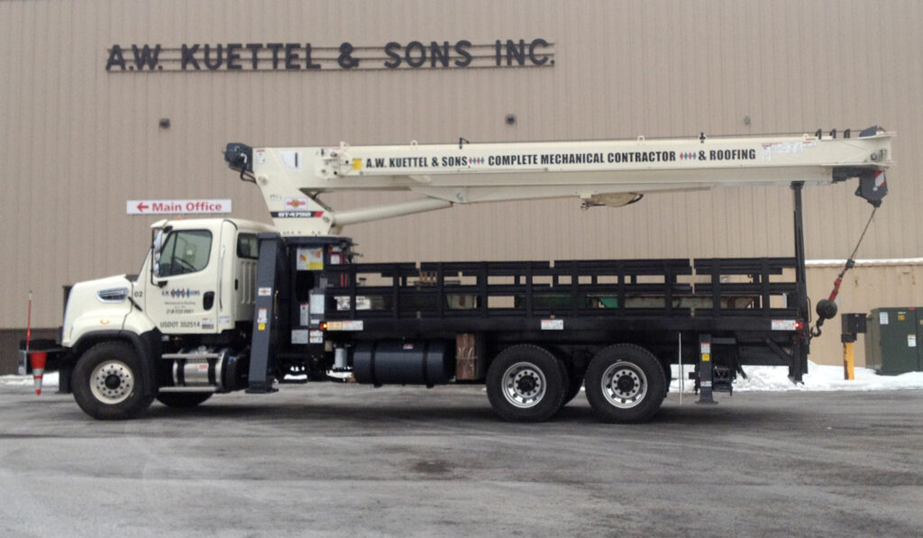 boom truck parked outside AW Kuettel & Son's facility
