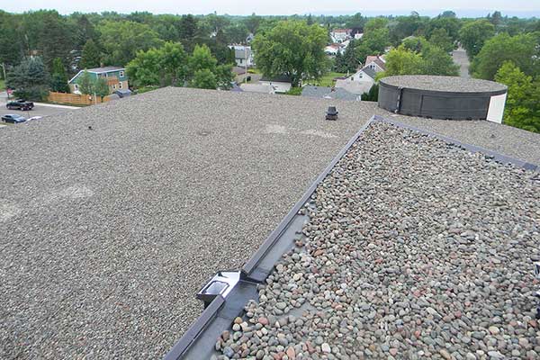 flat roof with rocks